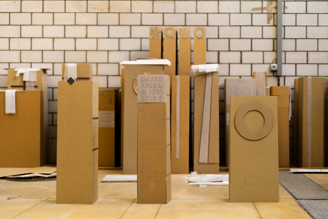 Gravestone prototypes made of cardboard