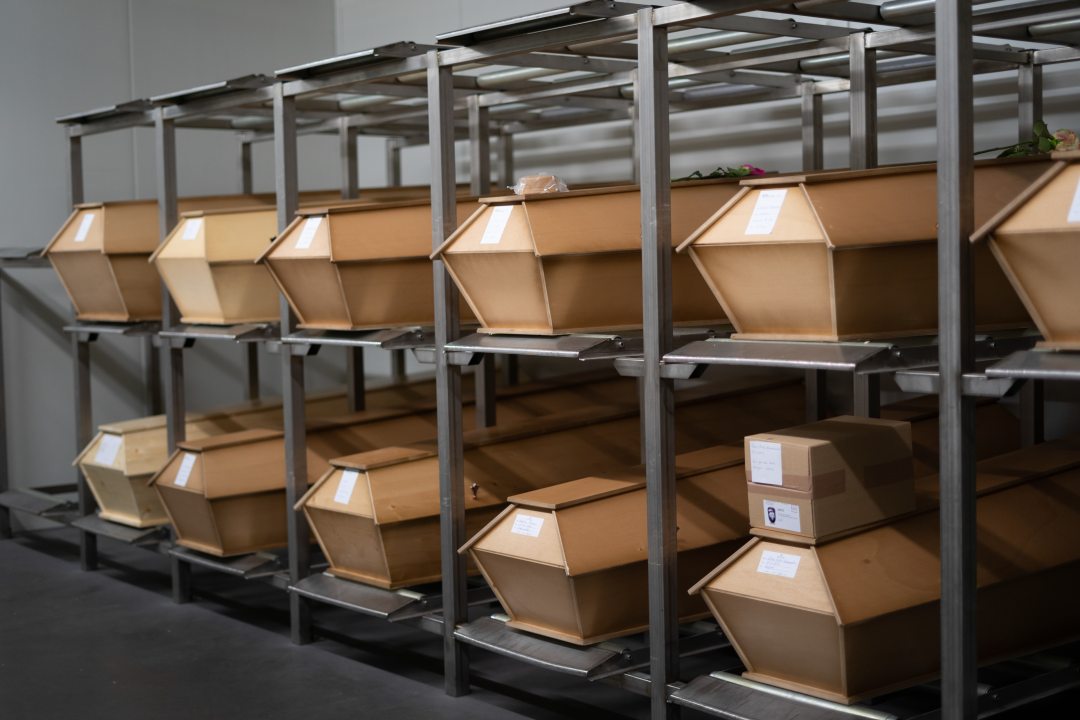 Several coffins in the cooling room of a crematorium.